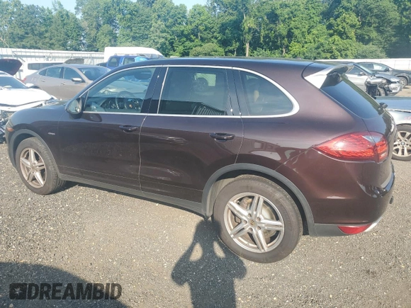 2014 Porsche Cayenne Diesel with VIN WP1AF2A23ELA49051, listed as a Copart auction lot 63105015 with 145,894 mi miles and Salvage title. Bid and sale history available at DreamBid. Image 2.