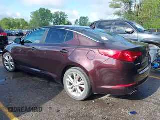 2013 Kia Optima EX with VIN 5XXGN4A71DG178586, listed as a IAAI auction lot 42171185 with 148,391 mi miles. Bid and sale history available at carsss.com. Image 3.