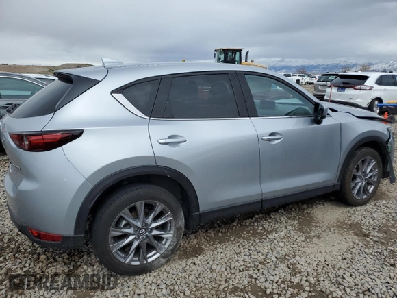 2021 Mazda CX-5 Grand Touring with VIN JM3KFBDM1M1403699, listed as a Copart auction lot 49888655 with 29,919 mi miles and Salvage Title. Bid and sale history available at carsss.com. Image 3.