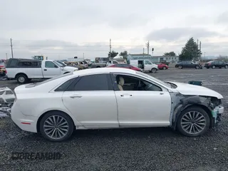 2017 Lincoln MKZ Premiere with VIN 3LN6L5A9XHR643569, listed as a IAAI auction lot 41471423 with 117,875 mi miles and . Bid and sale history available at DreamBid. Image 14.