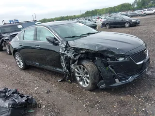 2023 Cadillac CT5 Premium Luxury z VIN 1G6DS5RK9P0110250, wystawiony jako IAAI lot #42543032 z przebiegiem 12 305 mil mil oraz . Historia ofert i sprzedaży dostępna na DreamBid. Obrazek 1.