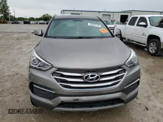 2018 Hyundai Santa Fe 2.4L z VIN 5NMZTDLB0JH087449, wystawiony jako Copart lot #58903105 z przebiegiem 114 037 mil mil oraz Szkoda całkowita • Salvage title. Historia ofert i sprzedaży dostępna na DreamBid. Obrazek 5.