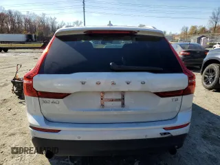2021 Volvo XC60 Momentum z VIN YV4102DK3M1760366, wystawiony jako Copart lot #81169744 z przebiegiem 52 405 mil mil oraz Szkody całkowita. Historia ofert i sprzedaży dostępna na DreamBid. Obrazek 6.