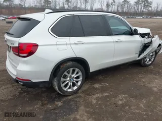 2016 BMW X5 xDrive35i with VIN 5UXKR0C57G0P24296, listed as a IAAI auction lot 41815189 with 116,084 mi miles. Bid and sale history available at carsss.com. Image 4.