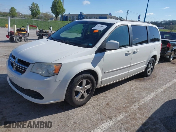2013 Dodge Grand Caravan SXT with VIN 2C4RDGCG2DR522136, listed as a IAAI auction lot 42023561 with 176,635 mi miles and . Bid and sale history available at DreamBid. Image 2.