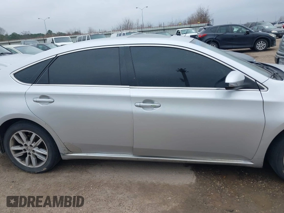 2013 Toyota Avalon XLE with VIN 4T1BK1EB4DU053880, listed as a IAAI auction lot 41605330 with 266,336 mi miles and . Bid and sale history available at DreamBid. Image 13.