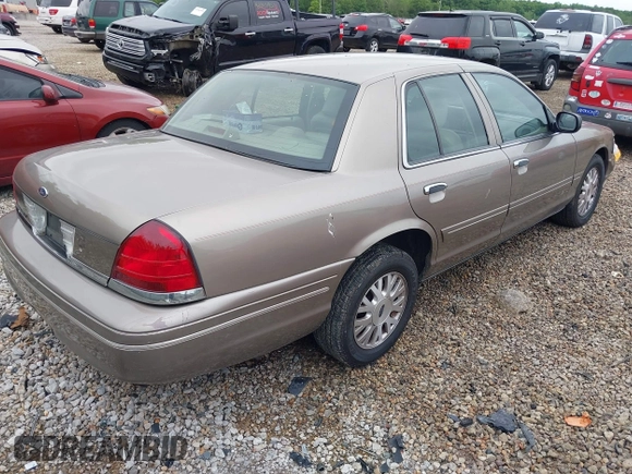 2004 Ford Crown Victoria LX z VIN 2FAFP74W74X114961, wystawiony jako IAAI lot #42347867 z przebiegiem 170 867 mil mil oraz . Historia ofert i sprzedaży dostępna na DreamBid. Obrazek 4.
