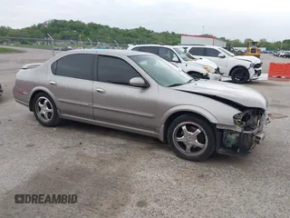 2002 Nissan Maxima GLE z VIN JN1DA31A32T308663, wystawiony jako IAAI lot #42136460 z przebiegiem 235 632 mil mil oraz . Historia ofert i sprzedaży dostępna na DreamBid. Obrazek 1.