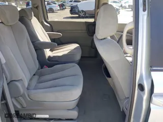 2006 Kia Sedona LX with VIN KNDMB233866086497, listed as a IAAI auction lot 41768099 with 181,030 mi miles. Bid and sale history available at carsss.com. Image 8.