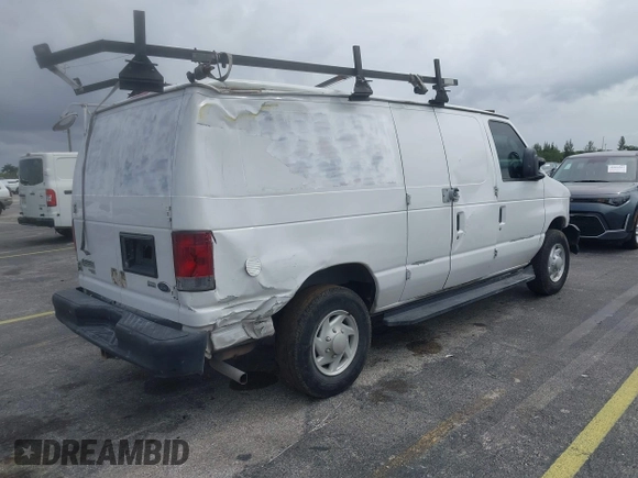 2013 Ford Econoline Cargo Commercial with VIN 1FTNE2EW6DDA10949, listed as a IAAI auction lot 41979346 with 250,952 mi miles and . Bid and sale history available at DreamBid. Image 4.