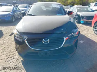 2018 Mazda CX-3 Touring with VIN JM1DKFC75J1302046, listed as a IAAI auction lot 40570799 with 62,554 mi miles. Bid and sale history available at carsss.com. Image 12.