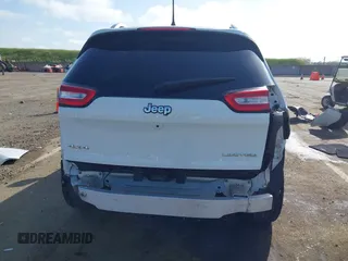 2016 Jeep Cherokee Limited with VIN 1C4PJMDS4GW310495, listed as a IAAI auction lot 41978324 with 70,182 mi miles. Bid and sale history available at carsss.com. Image 17.