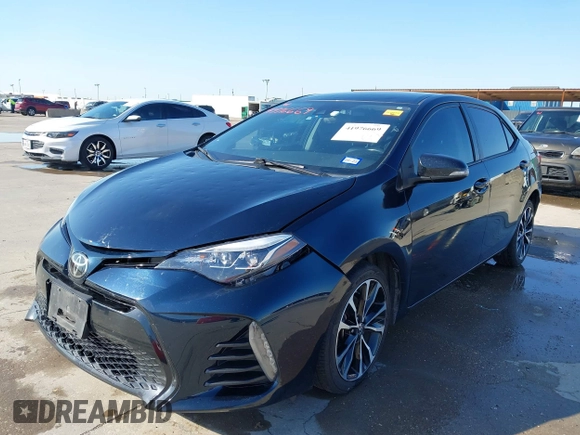 2019 Toyota Corolla L with VIN 2T1BURHE8KC164090, listed as a IAAI auction lot 41976669 with 163,794 mi miles and . Bid and sale history available at DreamBid. Image 18.