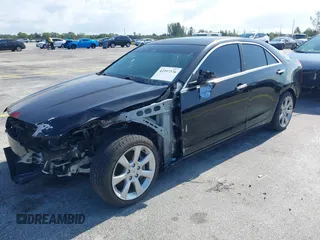 2013 Cadillac ATS Performance z VIN 1G6AC5S31D0125484, wystawiony jako IAAI lot #42357376 z przebiegiem 91 476 mil mil oraz . Historia ofert i sprzedaży dostępna na DreamBid. Obrazek 2.