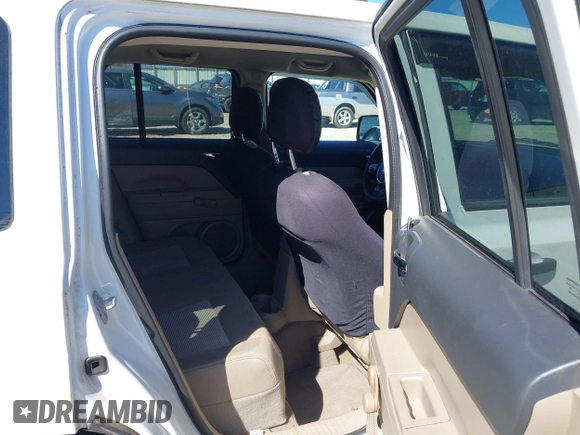 2011 Jeep Patriot Sport with VIN 1J4NT1GA1BD224580, listed as a IAAI auction lot 41670038 with 126,298 mi miles and . Bid and sale history available at carsss.com. Image 8.
