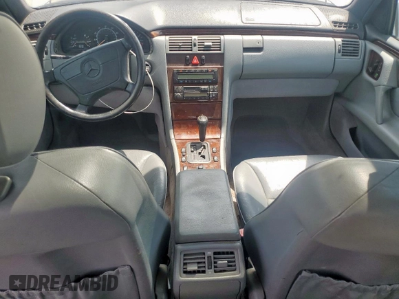 1997 Mercedes-Benz E-Class with VIN WDBJF55F3VA403290, listed as a Copart auction lot 53560555 with 0 mi miles and Clean Title. Bid and sale history available at carsss.com. Image 8.