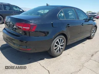2016 Volkswagen Jetta Sedan 1.4T SE with VIN 3VWD67AJ8GM368642, listed as a IAAI auction lot 42087079 with 90,974 mi miles. Bid and sale history available at carsss.com. Image 4.