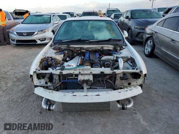 1995 Nissan Skyline z VIN ECR33060119, wystawiony jako Copart lot #76521404 z przebiegiem 134 480 mil mil oraz Szkoda całkowita • Salvage title. Historia ofert i sprzedaży dostępna na DreamBid. Obrazek 5.