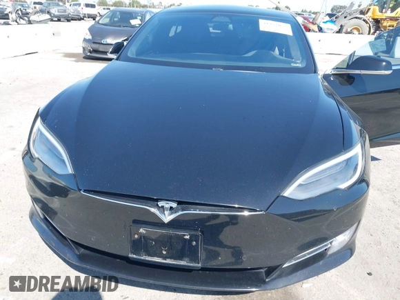 2017 Tesla Model S 100D with VIN 5YJSA1E21HF202591, listed as a IAAI auction lot 41983073 with 140,282 mi miles and . Bid and sale history available at DreamBid. Image 10.