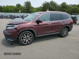 2020 Honda Pilot Touring 8-Passenger z VIN 5FNYF6H95LB043424, wystawiony jako Copart lot #59634335 z przebiegiem 65 964 mil mil oraz Szkoda całkowita • Salvage title. Historia ofert i sprzedaży dostępna na DreamBid. Obrazek 1.