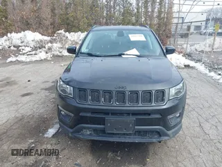 2018 Jeep Compass Altitude with VIN 3C4NJDBB1JT132052, listed as a IAAI auction lot 41622700 with 99,534 mi miles and . Bid and sale history available at carsss.com. Image 12.