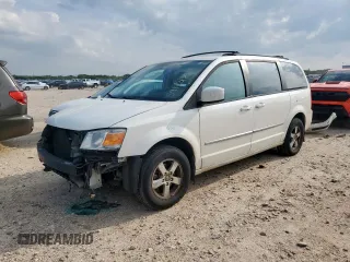 2010 Dodge Grand Caravan SXT z VIN 2D4RN5D14AR488677, wystawiony jako Copart lot #59163185 z przebiegiem 211 673 mil mil oraz Szkoda całkowita • Salvage title. Historia ofert i sprzedaży dostępna na DreamBid. Obrazek 1.