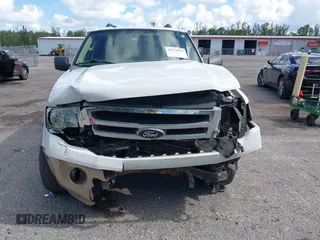 2014 Ford Expedition King Ranch with VIN 1FMJU1J50EEF14445, listed as a IAAI auction lot 42571073 with 125,174 mi miles and . Bid and sale history available at DreamBid. Image 6.