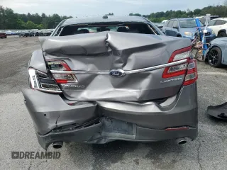 2014 Ford Taurus Limited with VIN 1FAHP2F88EG102674, listed as a Copart auction lot 62841285 with 107,378 mi miles and Salvage title. Bid and sale history available at DreamBid. Image 6.
