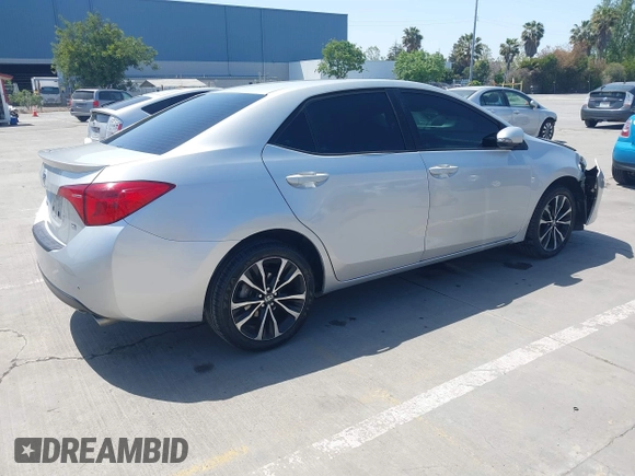 2019 Toyota Corolla L with VIN 5YFBURHE5KP877691, listed as a IAAI auction lot 42108591 with 85,813 mi miles and . Bid and sale history available at DreamBid. Image 4.