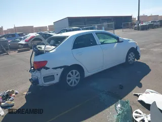 2010 Toyota Corolla with VIN 1NXBU4EE5AZ273756, listed as a IAAI auction lot 41311446 with 76,524 mi miles. Bid and sale history available at carsss.com. Image 4.