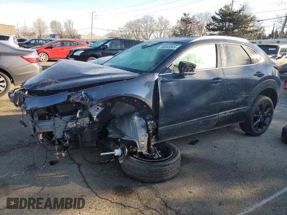 2023 Mazda CX-30 Premium Plus with VIN 3MVDMBEY9PM557107, listed as a Copart auction lot 46893065 with 10,404 mi miles and Salvage title. Bid and sale history available at DreamBid. Image 1.