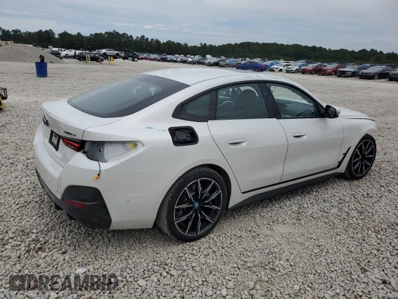 2024 BMW i4 eDrive40 z VIN WBY73AW07RFR74988, wystawiony jako Copart lot #70713824 z przebiegiem 14 117 mil mil oraz Szkody całkowita. Historia ofert i sprzedaży dostępna na DreamBid. Obrazek 3.