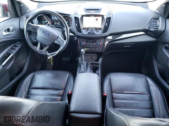 2017 Ford Escape Titanium with VIN 1FMCU0JD7HUD41107, listed as a Copart auction lot 85657084 with 197,982 mi miles and Salvage Title. Bid and sale history available at DreamBid. Image 8.