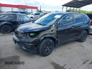 2015 Honda CR-V LX with VIN 2HKRM4H38FH601802, listed as a IAAI auction lot 42177101 with 71,775 mi miles and . Bid and sale history available at DreamBid. Image 6.