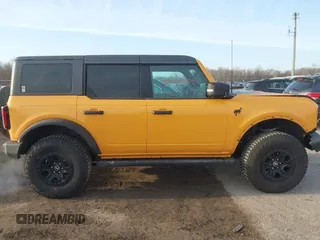 2022 Ford Bronco with VIN 1FMEE5DP8NLB67834, listed as a IAAI auction lot 41772622 with 58,667 mi miles. Bid and sale history available at carsss.com. Image 14.