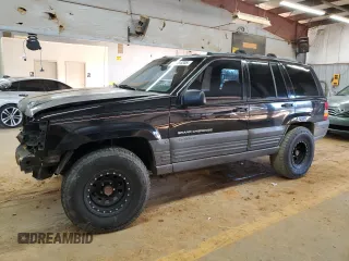 1996 Jeep Grand Cherokee Laredo with VIN 1J4GZ58S9TC370707, listed as a Copart auction lot 89285205 with 278,457 mi miles and Salvage Title. Bid and sale history available at carsss.com. Image 1.