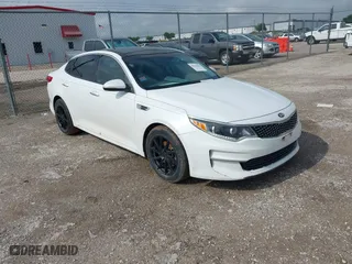 2016 Kia Optima EX with VIN 5XXGU4L38GG013197, listed as a IAAI auction lot 42125301 with 110,128 mi miles. Bid and sale history available at carsss.com. Image 1.