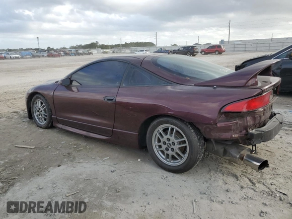 1999 Mitsubishi Eclipse with VIN 4A3AK44Y7XE104372, listed as a Copart auction lot 78361734 with 112,595 mi miles and Salvage Title. Bid and sale history available at DreamBid. Image 2.