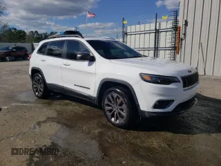 2021 Jeep Cherokee Latitude Lux with VIN 1C4PJLMX3MD125612, listed as a Copart auction lot 49050555 with 136,183 mi miles and Salvage title. Bid and sale history available at DreamBid. Image 4.