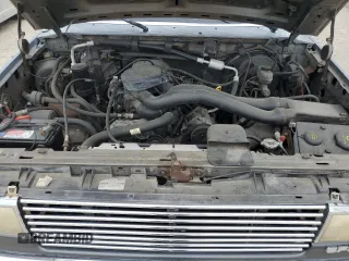 1990 Ford F-150 z VIN 1FTDF15N7LNB38801, wystawiony jako Copart lot #59738475 z przebiegiem 273 718 mil mil oraz Czysty tytuł • Clean title. Historia ofert i sprzedaży dostępna na DreamBid. Obrazek 11.