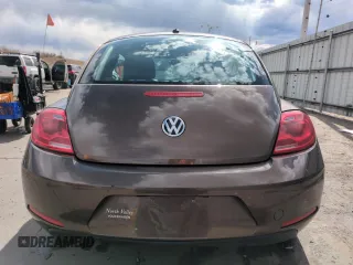 2013 Volkswagen Beetle with VIN 3VWHX7AT8DM603424, listed as a Copart auction lot 51019185 with 136,196 mi miles and Salvage Title. Bid and sale history available at DreamBid. Image 6.