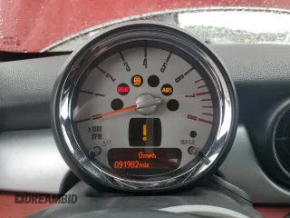 2012 MINI Coupe S z VIN WMWSX3C54CT155356, wystawiony jako Copart lot #72522854 z przebiegiem 91 982 mil mil oraz Szkody całkowita. Historia ofert i sprzedaży dostępna na DreamBid. Obrazek 9.