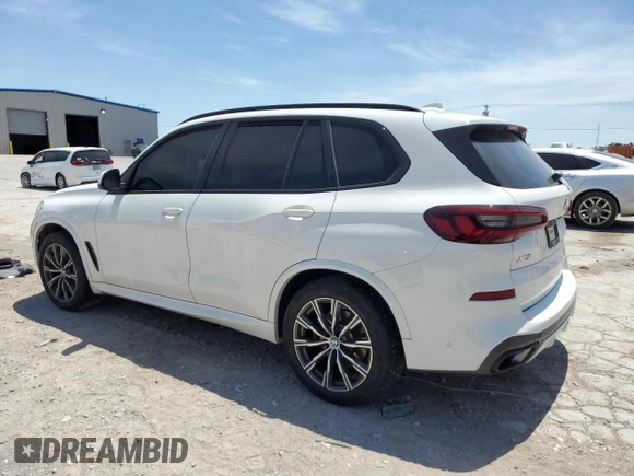 2021 BMW X5 xDrive40i with VIN 5UXCR6C00M9E61512, listed as a Copart auction lot 56456745 with Not provided miles and Salvage title. Bid and sale history available at DreamBid. Image 2.