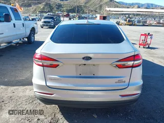 2019 Ford Fusion SE with VIN 3FA6P0LUXKR208139, listed as a IAAI auction lot 41820958 with 66,609 mi miles and . Bid and sale history available at DreamBid. Image 16.