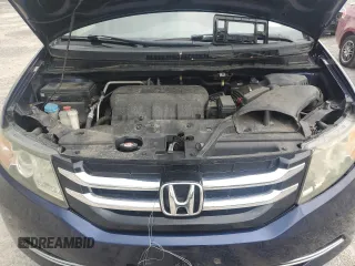 2014 Honda Odyssey EX-L with VIN 5FNRL5H63EB013483, listed as a Copart auction lot 63002435 with 127,059 mi miles and Salvage title. Bid and sale history available at DreamBid. Image 12.