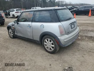 2004 MINI Hardtop with VIN WMWRC33424TJ63121, listed as a Copart auction lot 45724105 with 215,449 mi miles and Salvage Title. Bid and sale history available at DreamBid. Image 2.