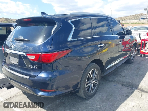 2016 Infiniti QX60 with VIN 5N1AL0MNXGC520860, listed as a IAAI auction lot 41955662 with 165,716 mi miles. Bid and sale history available at carsss.com. Image 4.