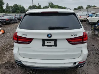 2016 BMW X5 xDrive40e z VIN 5UXKT0C57G0S77082, wystawiony jako Copart lot #59982295 z przebiegiem 121 725 mil mil oraz Czysty tytuł • Clean title. Historia ofert i sprzedaży dostępna na DreamBid. Obrazek 6.