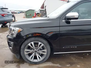2019 Ford Expedition Platinum with VIN 1FMJU1MT8KEA02325, listed as a IAAI auction lot 41861772 with 77,124 mi miles. Bid and sale history available at carsss.com. Image 20.