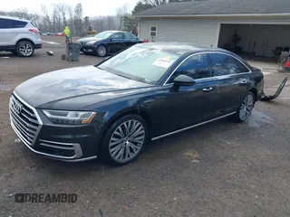 2019 Audi A8 L with VIN WAU8DAF84KN019115, listed as a IAAI auction lot 41856931 with 84,387 mi miles. Bid and sale history available at carsss.com. Image 2.